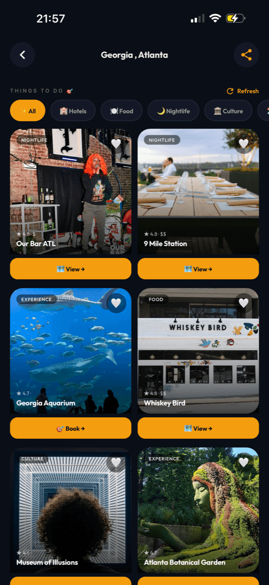 Exploring Atlanta in TripBau — filterable cards with photos, ratings, and Book buttons